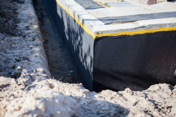Professional Interior Drainage System technician working in Leon, KS